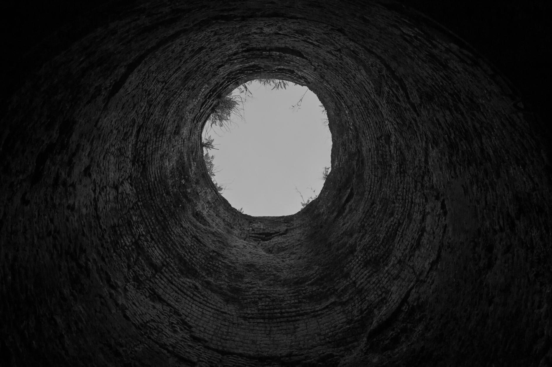 Stock photo of the view from the bottom of a well from Pexels.com
