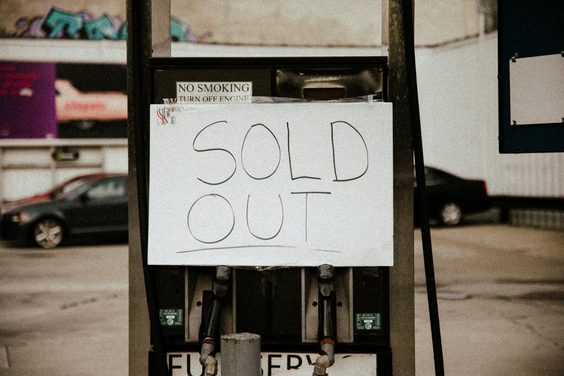 Stock photo of a gas pump with a hand made Sold Out sign on it from Pexels.com