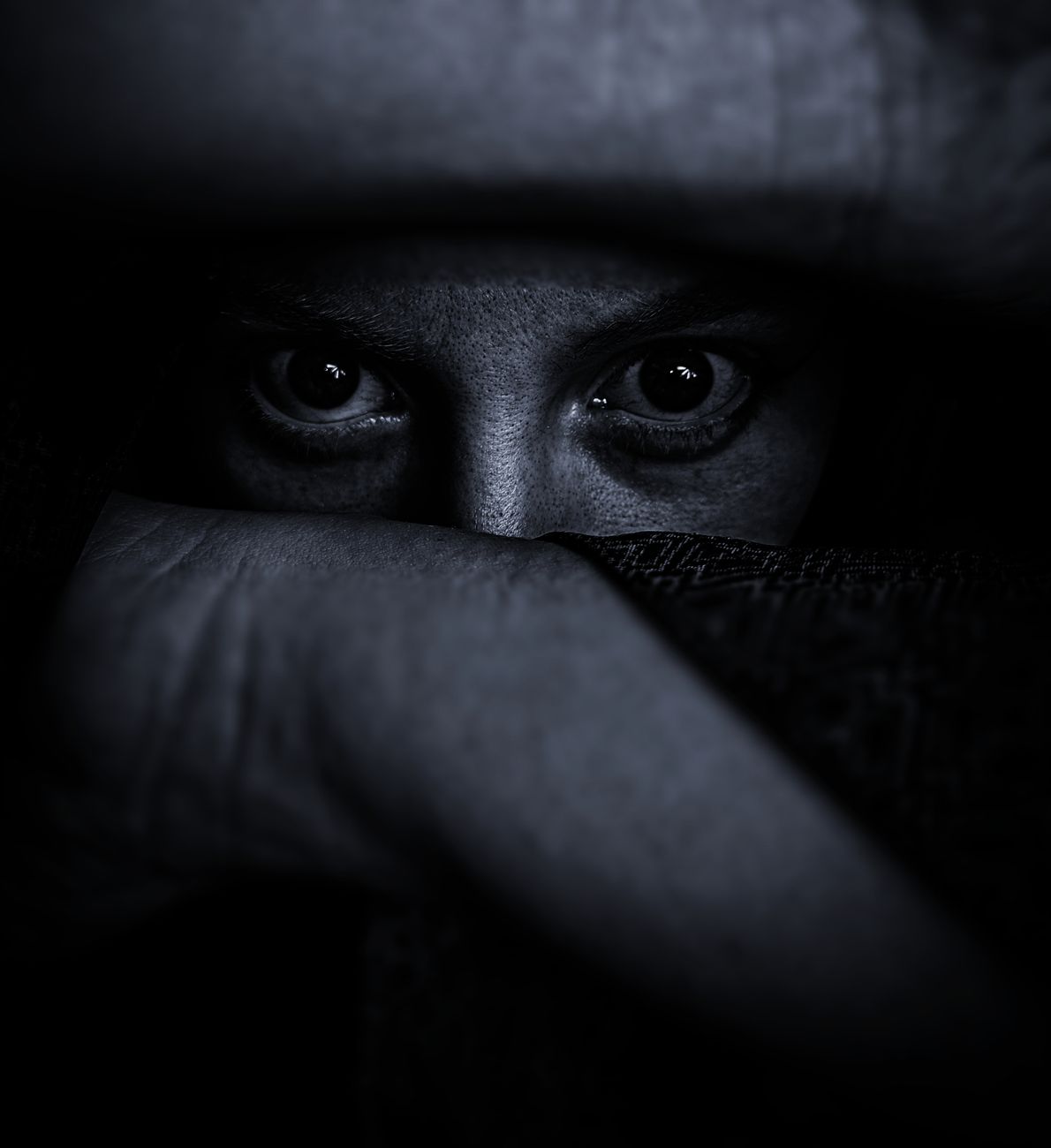 Stock B & W photo of a pair of eyes staring through a split in a surface from Pexels.com
