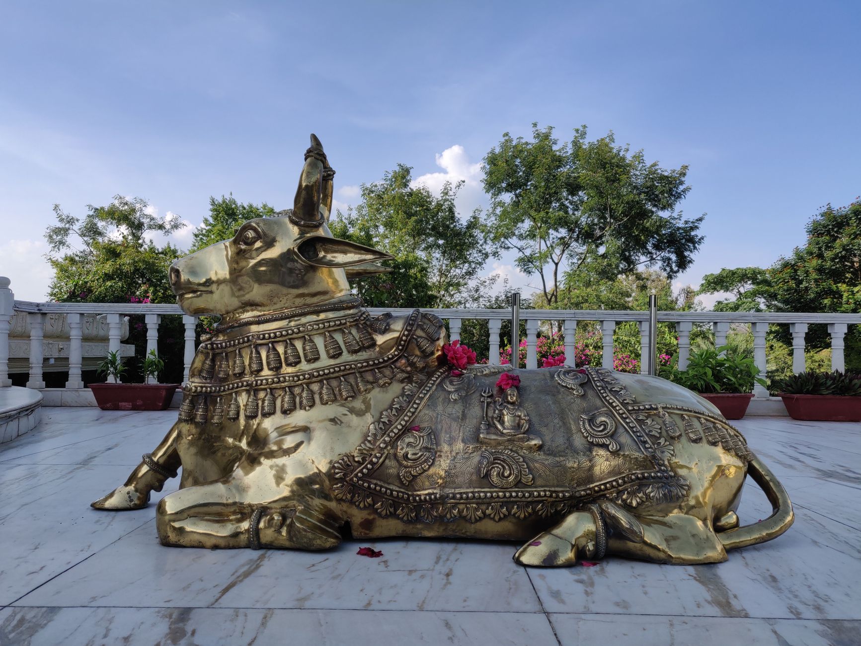 Stock photo of a golden calf statue lying on it's belly from Pexels.com 