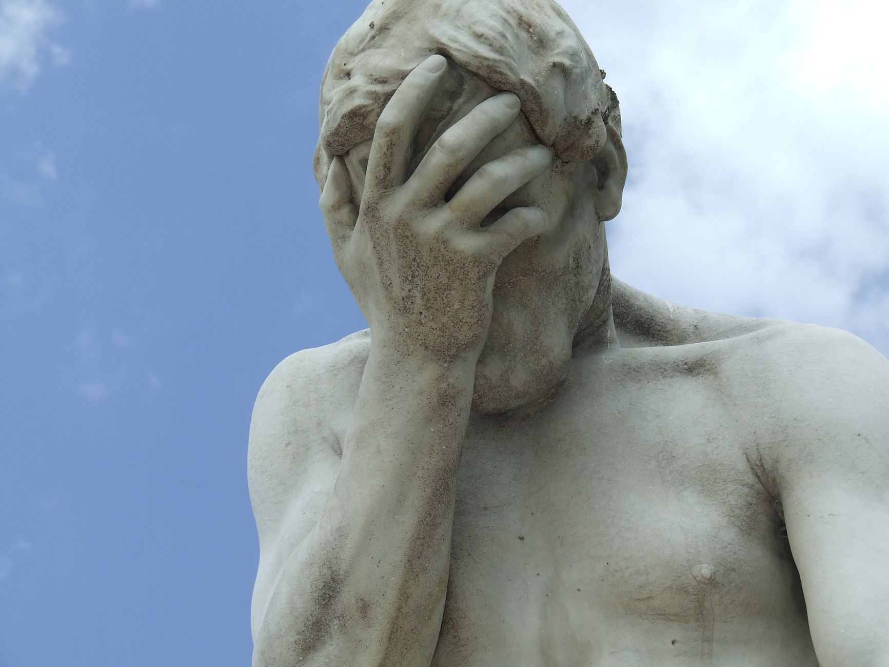 Stock photo of a human statue with a face palm feeling from Pexels.com