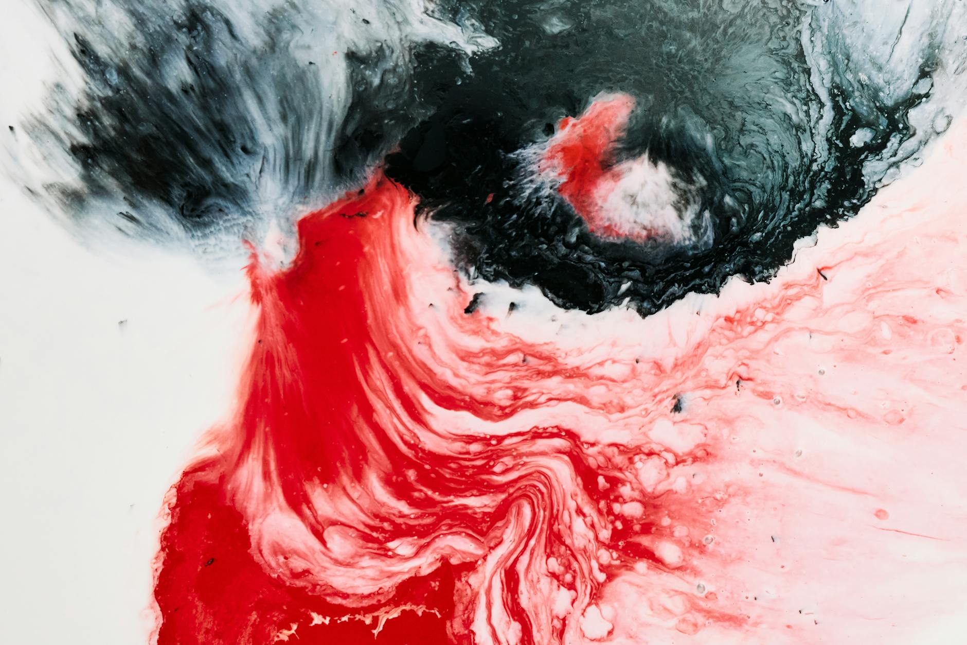 Stock photo of abstract red liquid infiltrating black liquid from Pexels.com 