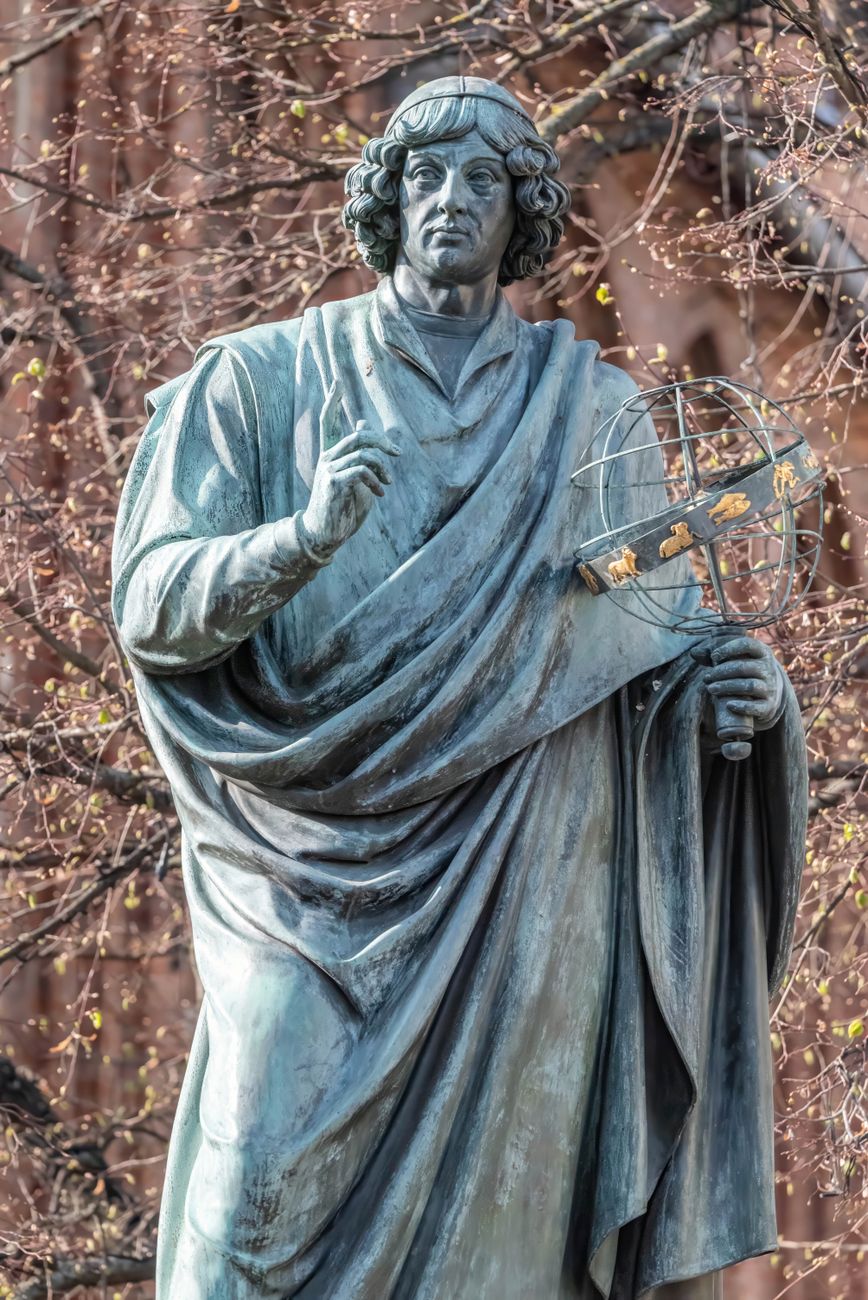 Stock photo of bronze monument dedicated to astronomer Nicolaus Copernicus from Pexels.com