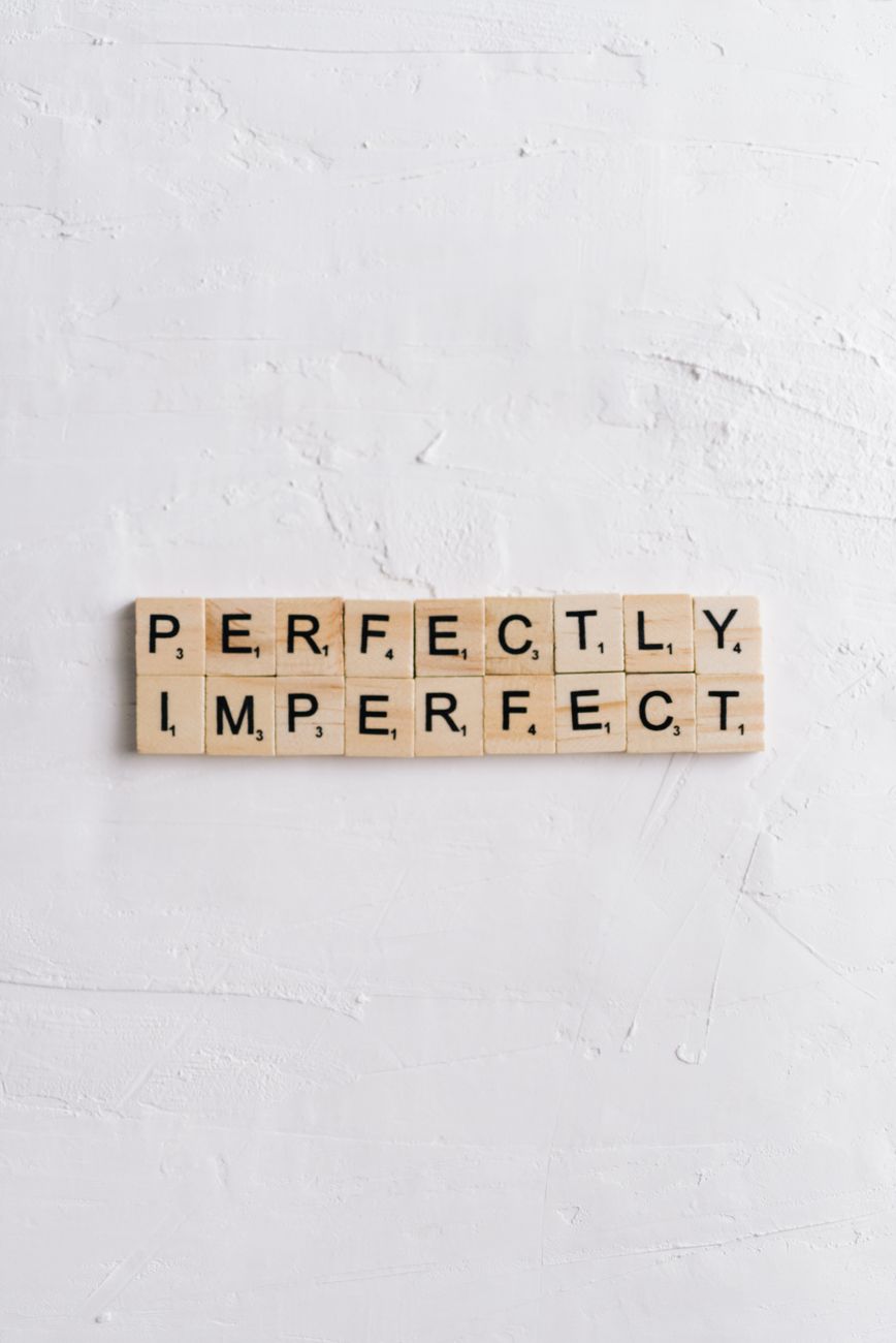 Stock photo of Scrabble letters spelling out "Perfectly Imperfect"
from Pexels.com